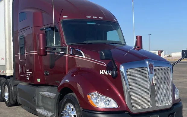 Semi-truck with an enclosed dry van trailer